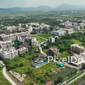 PD1057 - Aerial Drone Pan of Suburban Residential Township with Mountain Backdrop