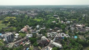 PD1053 - Aerial Drone Flight Over Urbanizing Village Landscape