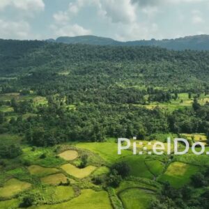 PD1039 - Aerial Drone Pan Over Scenic Valley with Forests and Fields