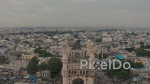 PD1268 - Aerial Dolly View Flying Towards Historic Charminar and Busy Market
