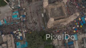 PD1264 - Top-Down Aerial View of Charminar Monument and Crowded Market Square