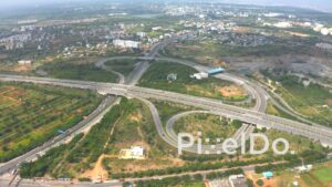 PD1318 - Aerial View of Massive Highway Cloverleaf Interchange and Traffic