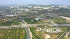 PD1317 - Aerial View of Massive Highway Cloverleaf Interchange and Landscape