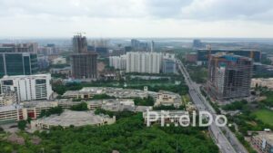 PD1346 - Aerial View of Corporate Campus and Developing Financial District Skyline