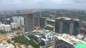 PD1321 - Aerial View of Massive High-Rise Construction Site and Cranes