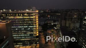 PD1412 - Aerial Night View of Corporate District and Illuminated Cable Bridge