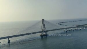 PD1235 - Aerial Orbit Around Bandra Worli Sea Link Pylon Over Ocean